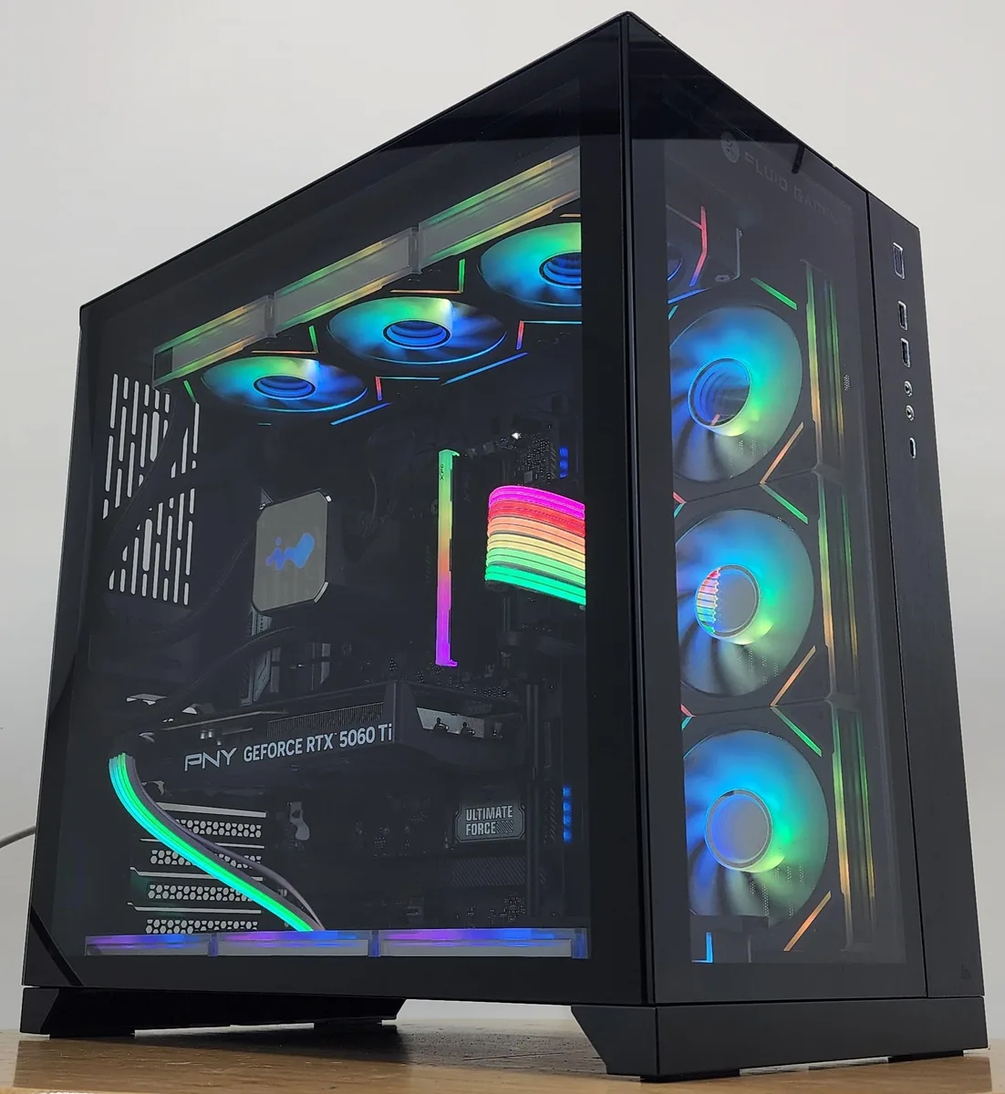 Black Lian Li O11 Dynamic ATX case with 360mm AIO RGB cooler and RTX 5060 Ti graphics card