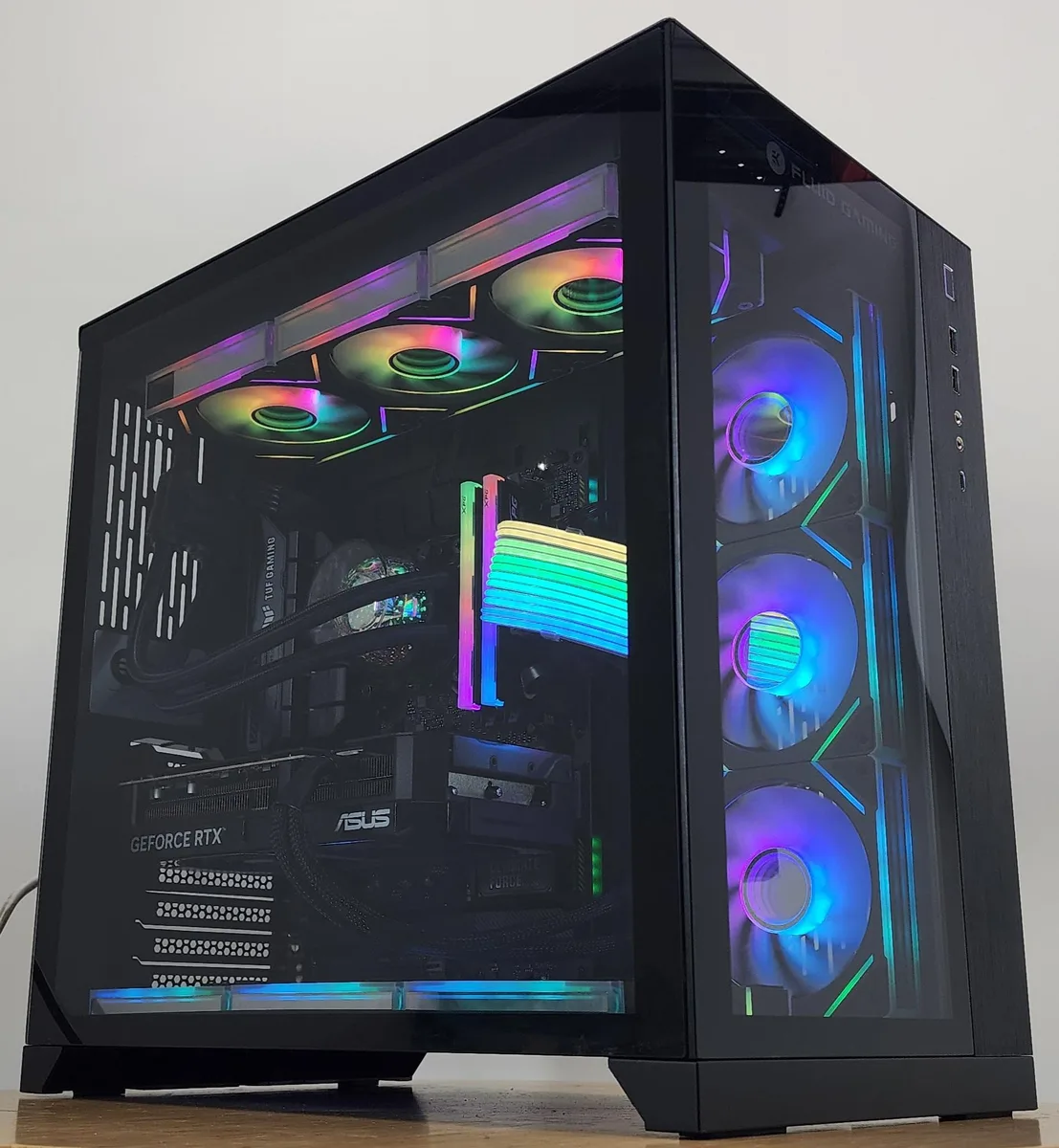 Black Lian Li O11 Dynamic ATX case with 360mm AIO RGB cooler and RTX 5070 graphics card visible