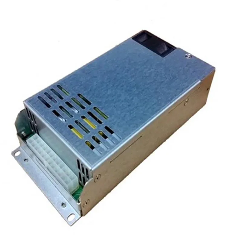 Compact silver ATX power supply unit with fan grille