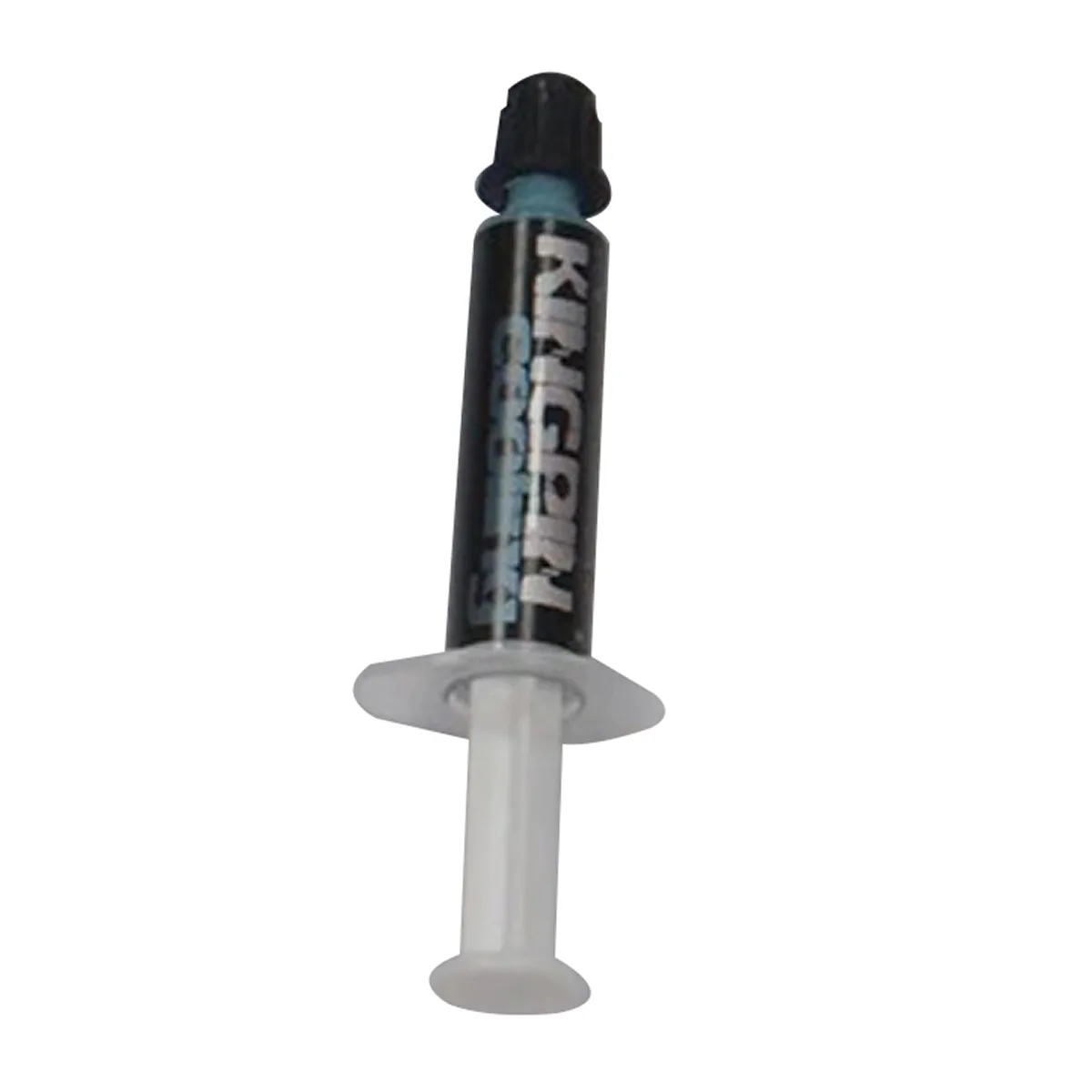 Small white syringe with black cap and silver spreading spoon