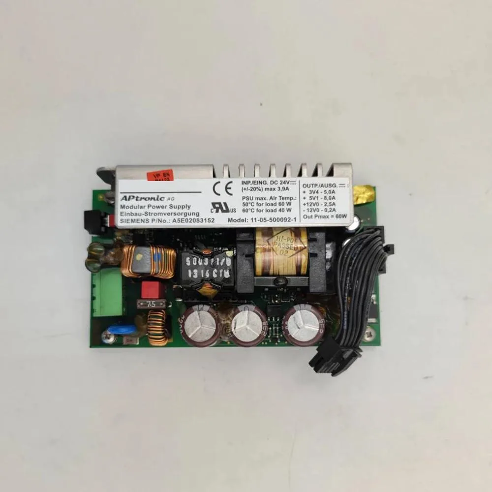 Silver ATX power supply unit with fan grille