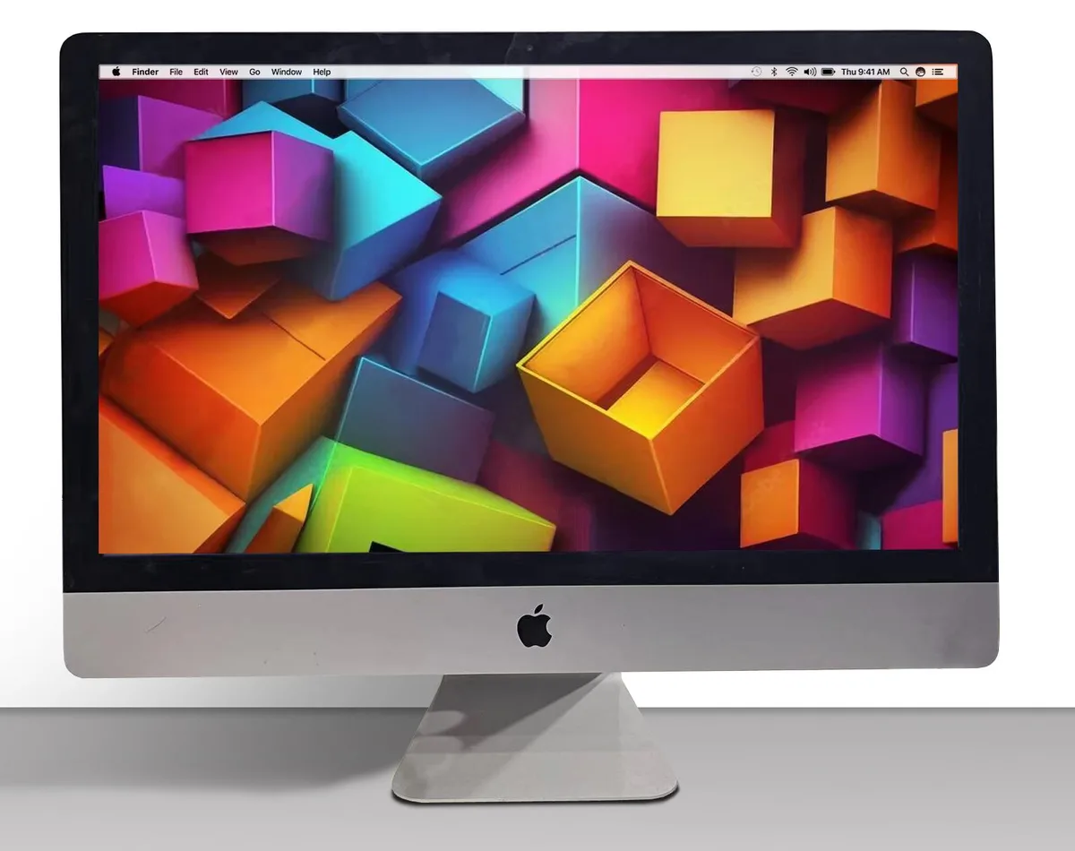 Silver 27-inch all-in-one iMac with tapered aluminium rear, 5K Retina display, keyboard and mouse