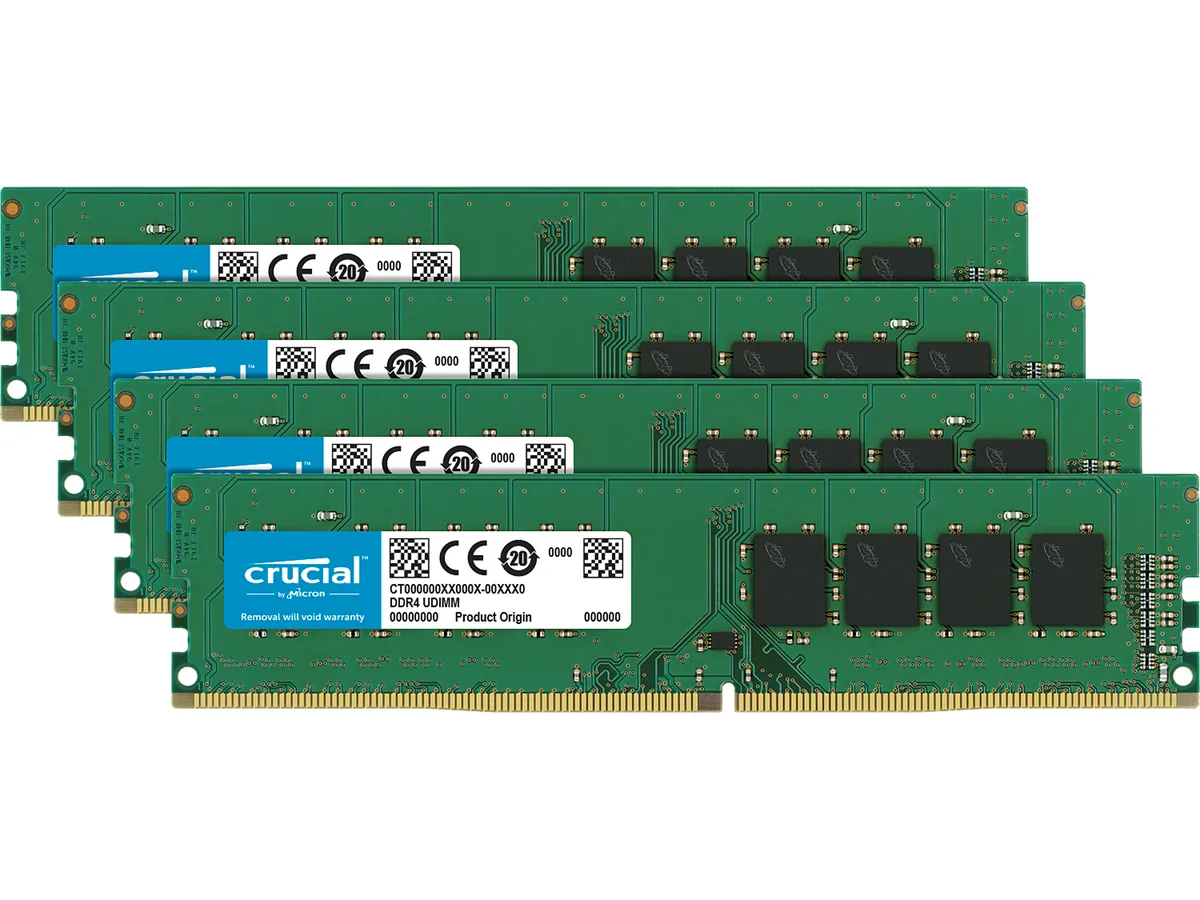 Four green DDR4 DIMM sticks with black chips and silver labels