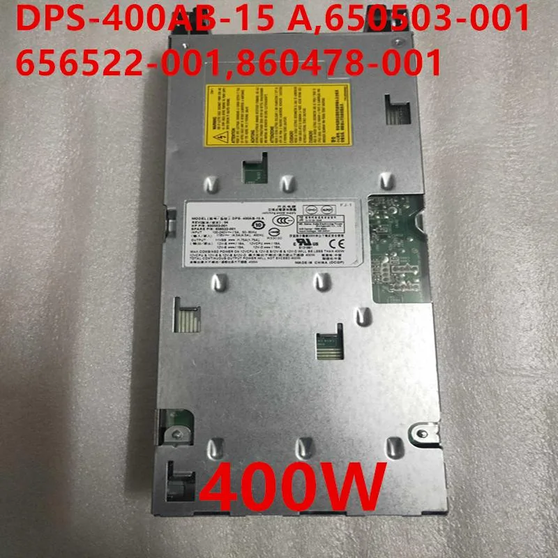 Rectangular metal PSU unit with rear fan grille and side label
