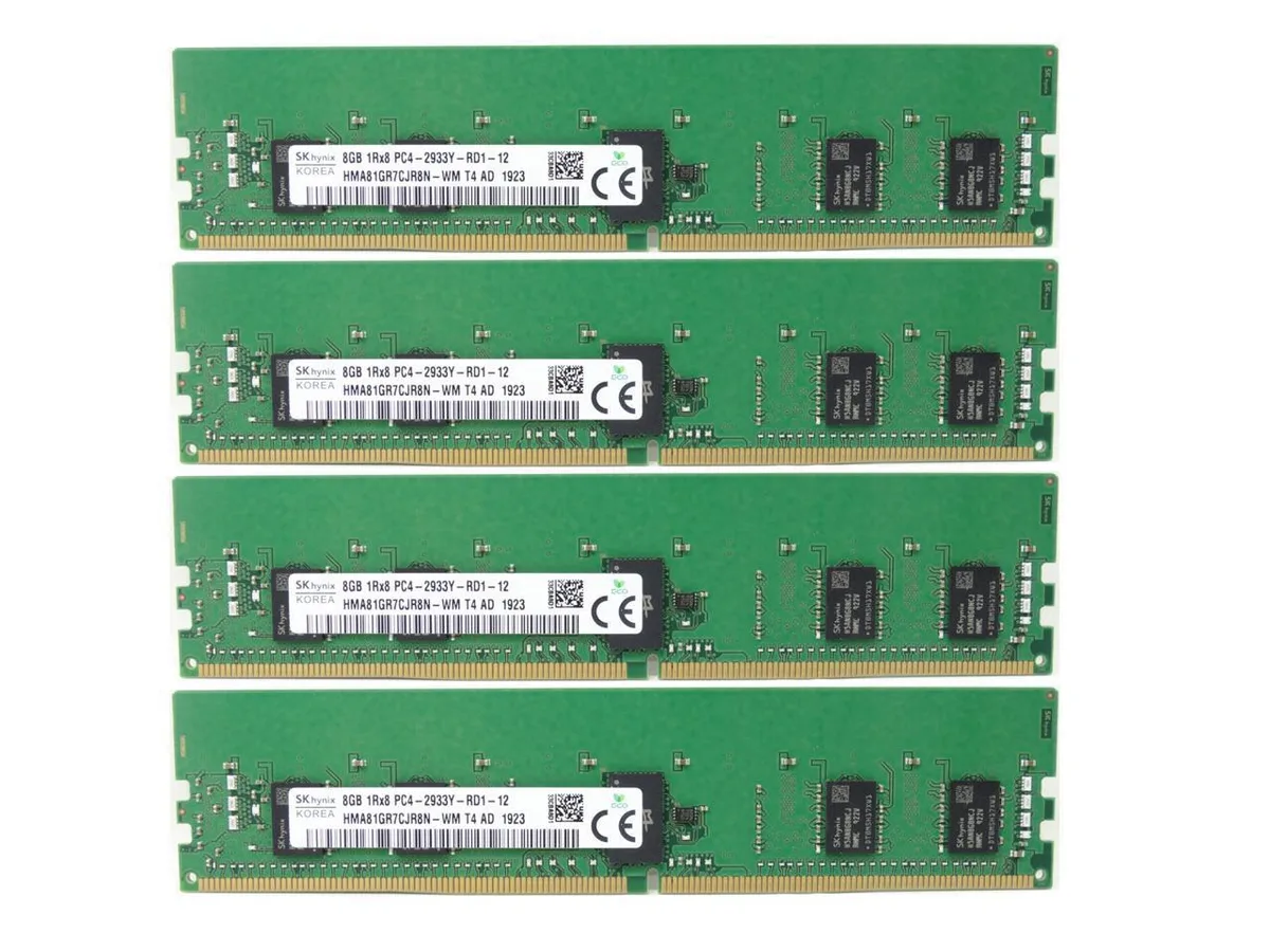 Four green DDR4 RDIMM modules with black heat spreaders and gold contacts