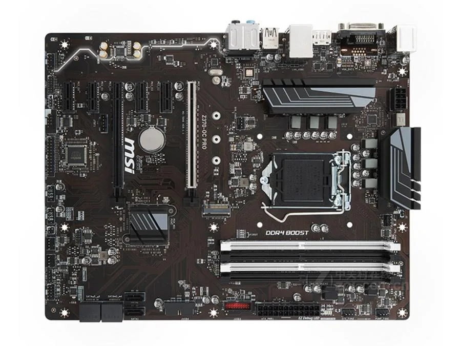 Black ATX motherboard with silver heatsinks and LGA 1151 socket
