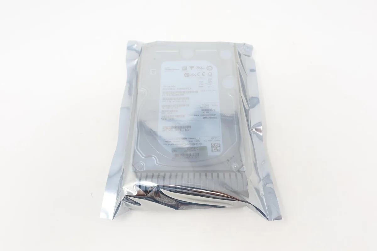 Silver 3.5 inch hard drive with circuit board visible on underside
