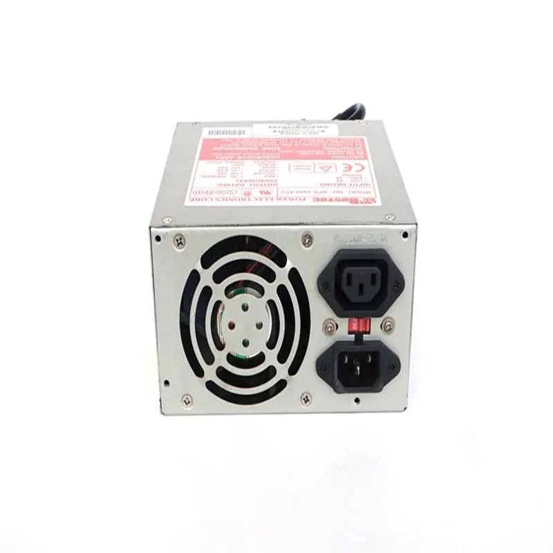 Rectangular silver ATX power supply unit with fan grille and cable bundle