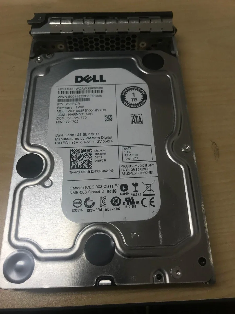Silver 3.5 inch SATA hard drive with circuit board visible