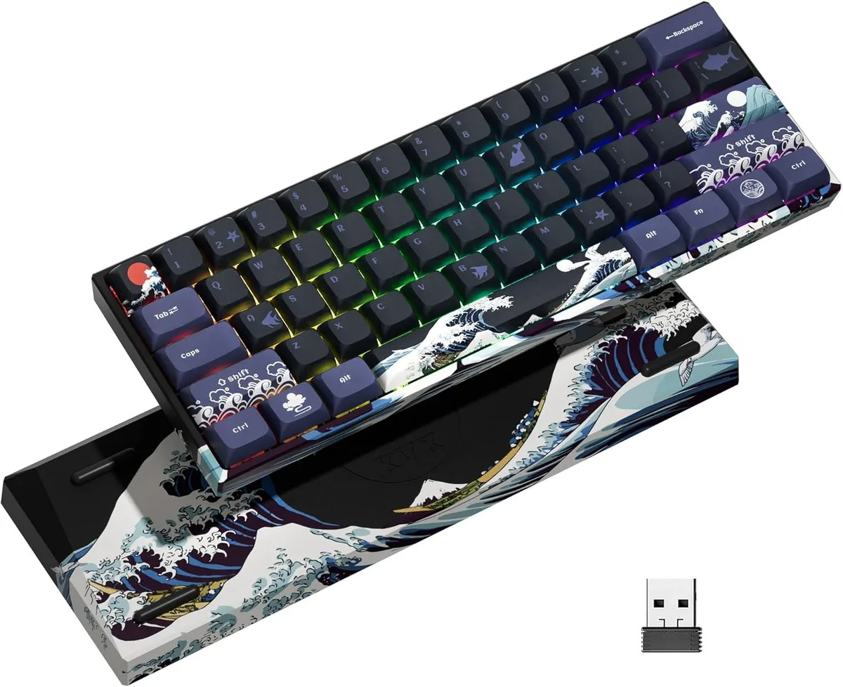 Compact 60 percent mechanical keyboard with coral wave artwork on PBT keycaps and case, USB-C cable attached