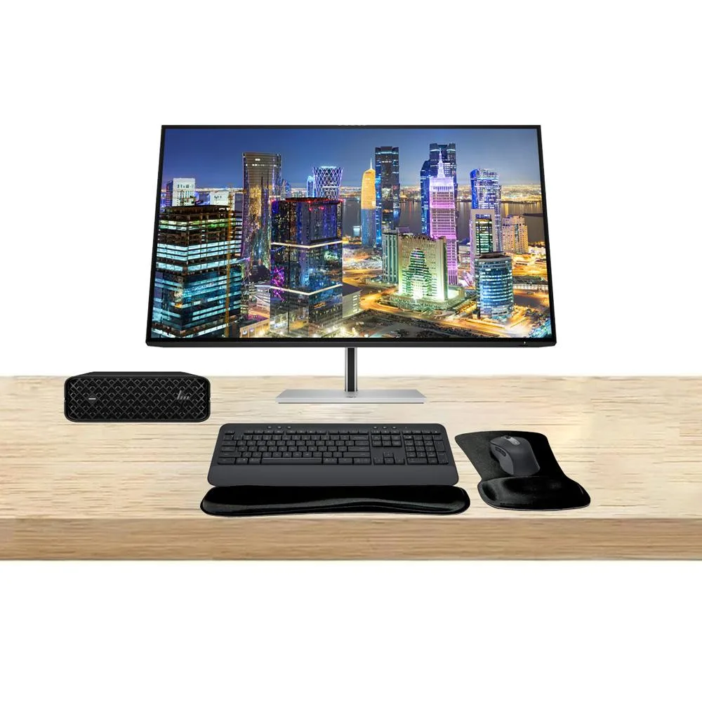 Compact black mini PC, 32 inch 4K monitor, wireless graphite keyboard and mouse