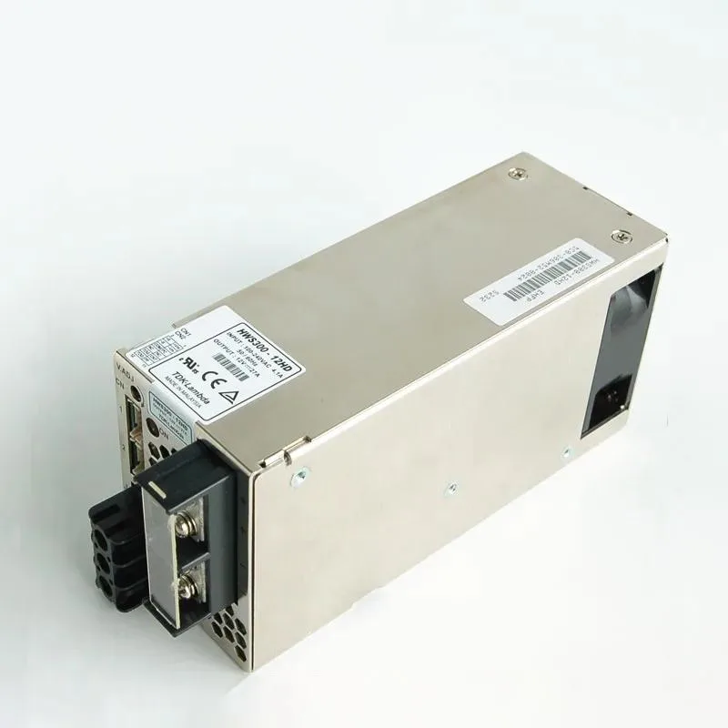 Silver ATX power supply unit with side label showing 300W 12V 27A ratings