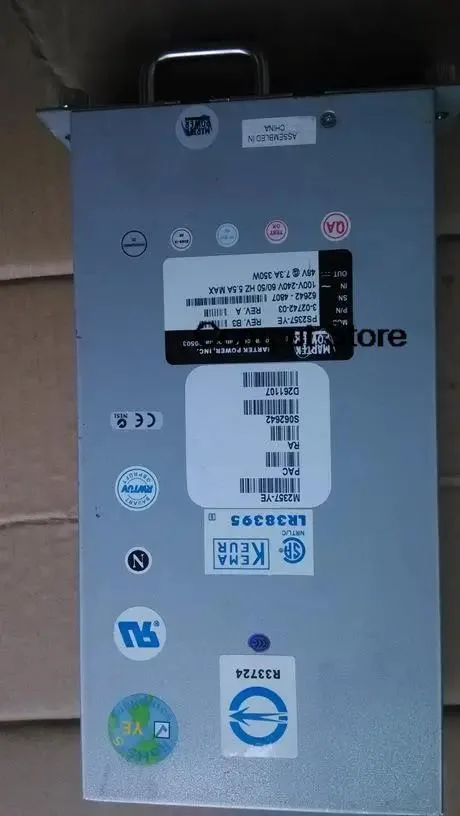 Rectangular ATX power supply unit with metal casing and ventilation grill