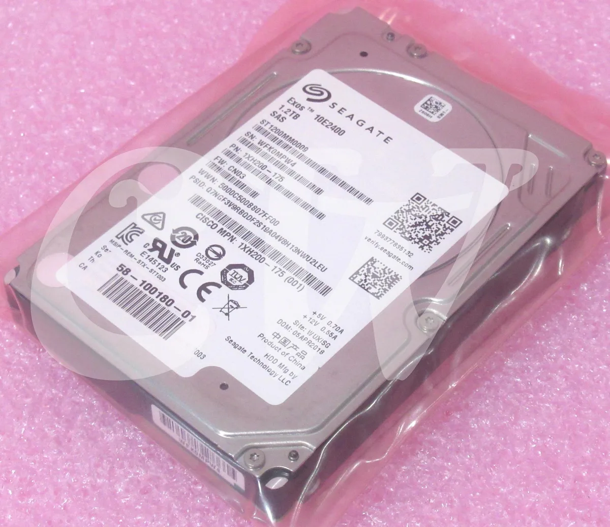 A silver 2.5 inch SAS hard drive with circuit board visible