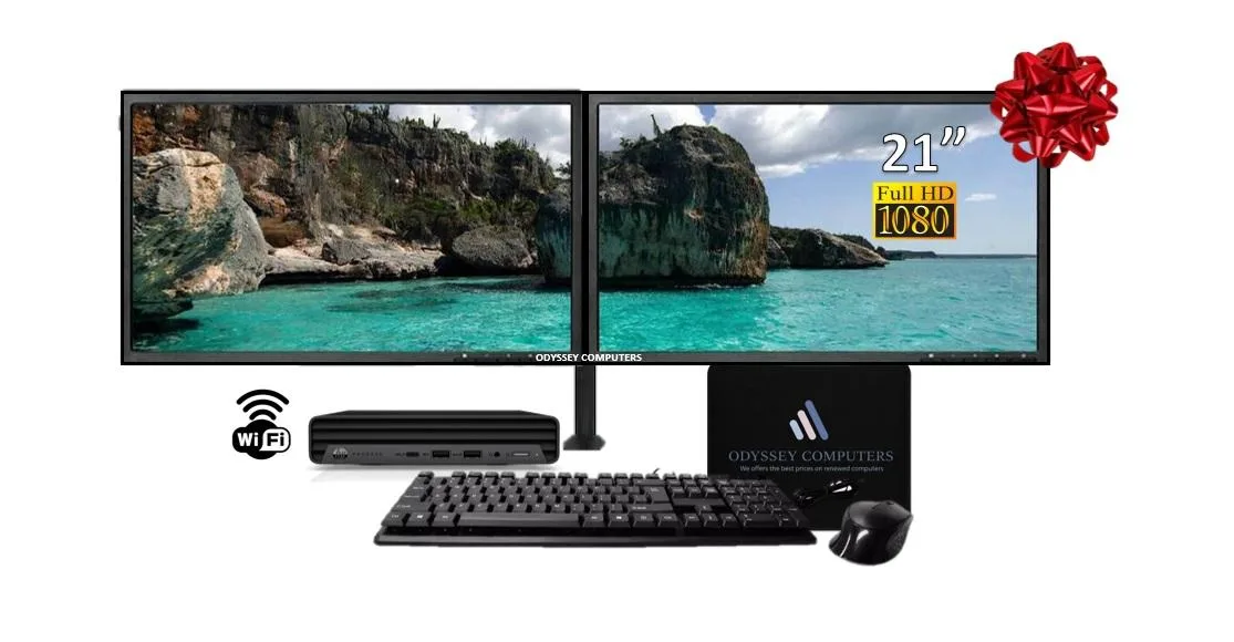 Small black mini desktop with two 21 inch monitors keyboard and mouse