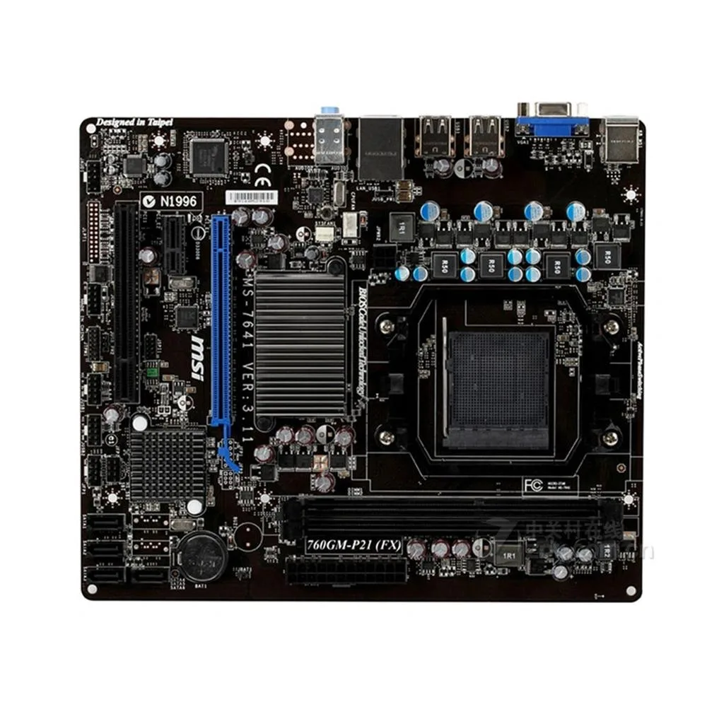 Green Micro ATX motherboard with black sockets and silver heatsinks