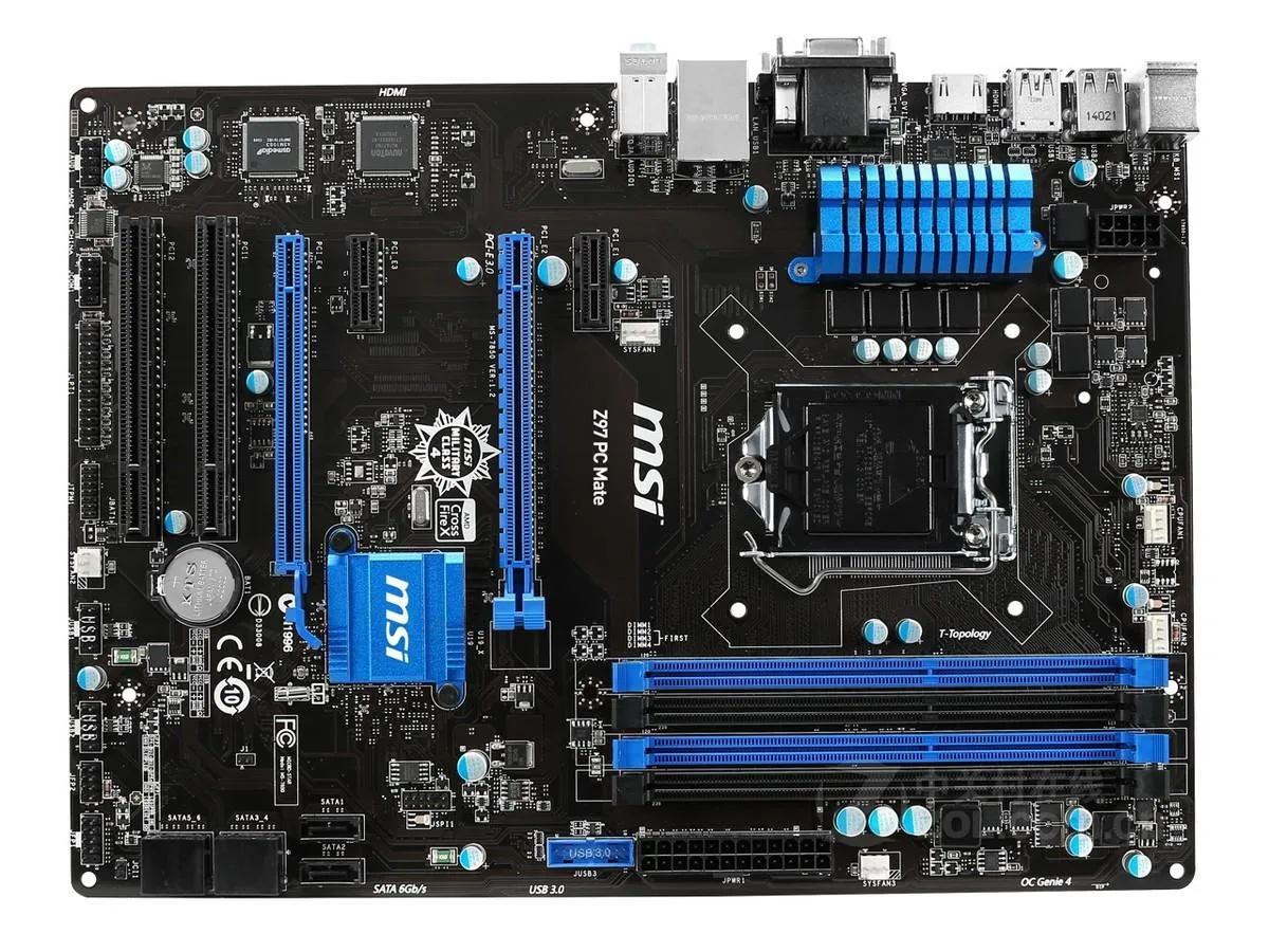 ATX motherboard in black with silver heatsinks and blue PCIe slots