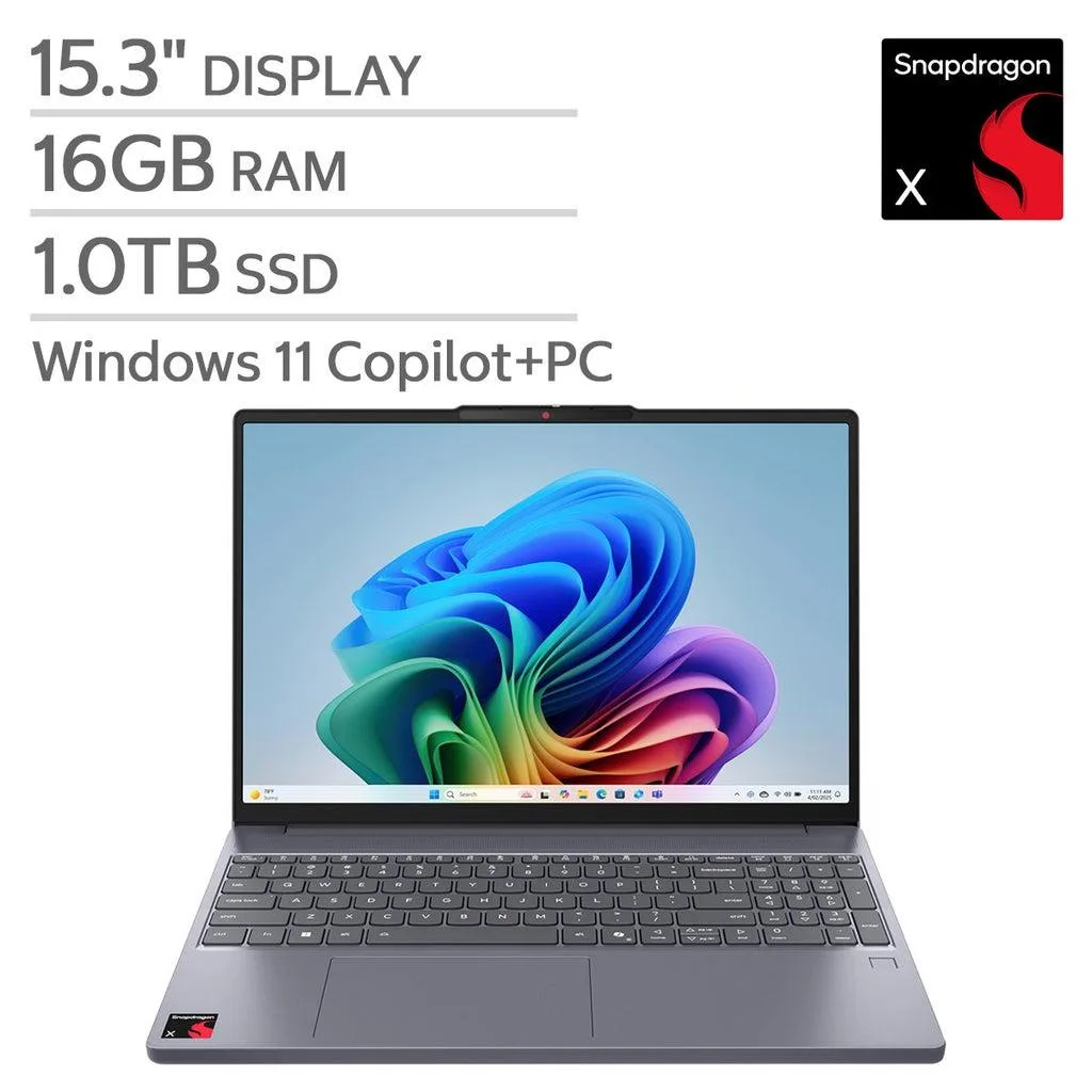 Silver-grey ultra-slim 15.3 inch touchscreen laptop closed on a plain surface
