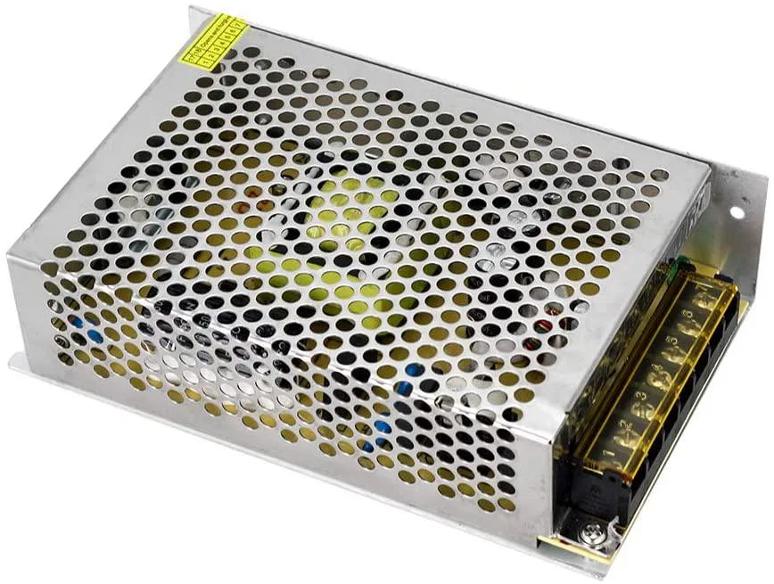 Rectangular metal power supply unit with screw terminals and ventilation slots