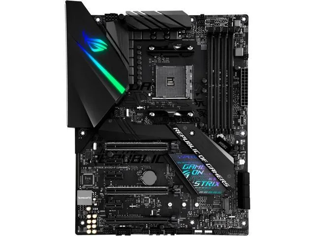 Black ATX motherboard with grey heatsinks and RGB lighting zones