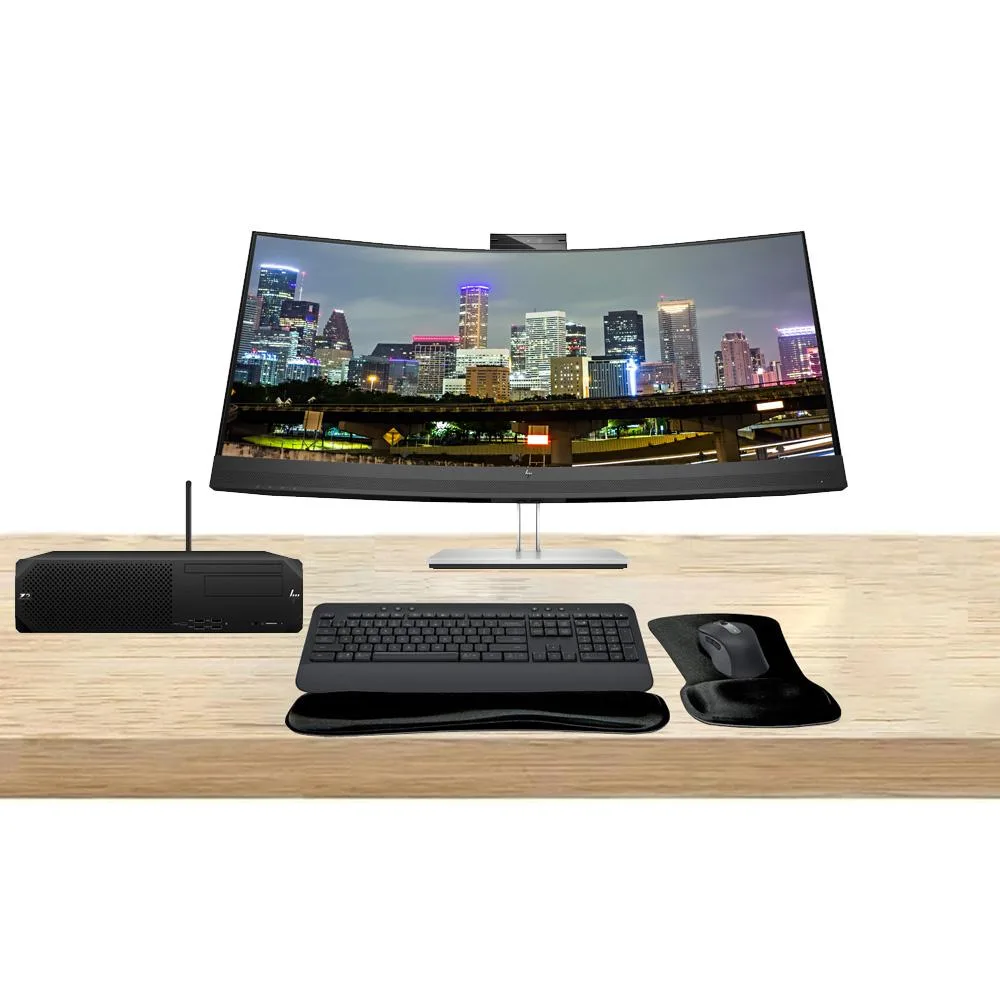 Compact silver tower, curved 34-inch monitor, wireless keyboard and mouse set