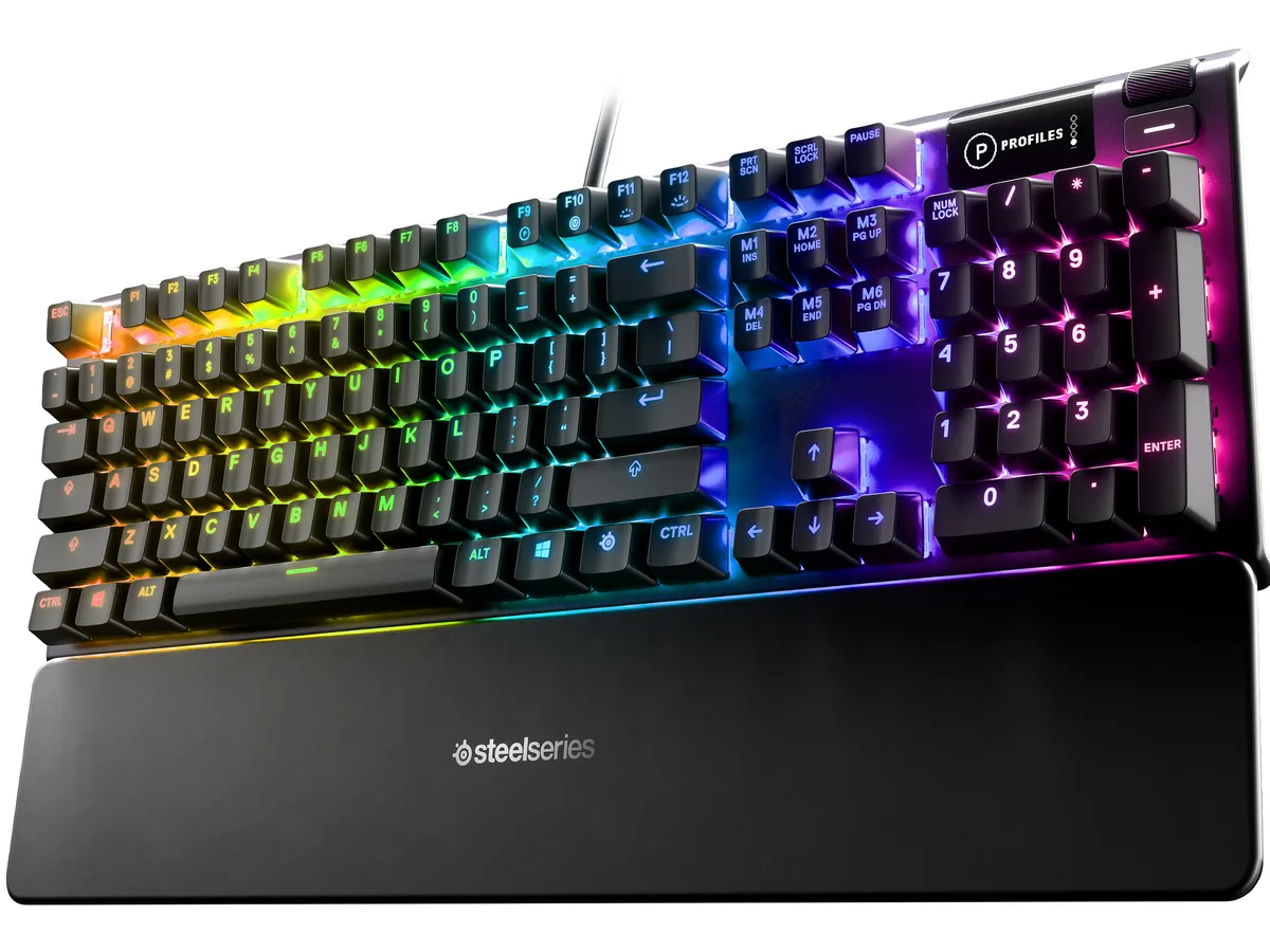 Full-size black gaming keyboard with aluminium frame, per-key RGB lighting, OLED display and detachable magnetic wrist rest