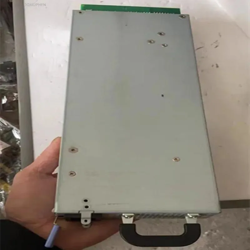 Rectangular ATX power supply unit with matte black finish and cooling fan grille
