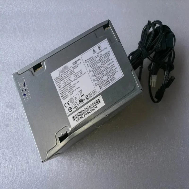 Rectangular black metal ATX power supply unit with cooling fan visible on one side