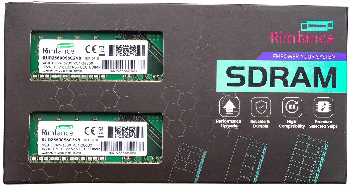 Two green circuit boards with black memory chips and gold edge connectors