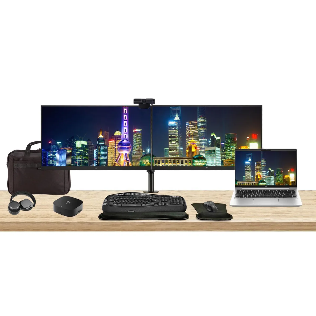 Silver 14 inch laptop, two 24 inch monitors on a dual clamp stand, USB-C dock, wireless keyboard and mouse, webcam, headphones