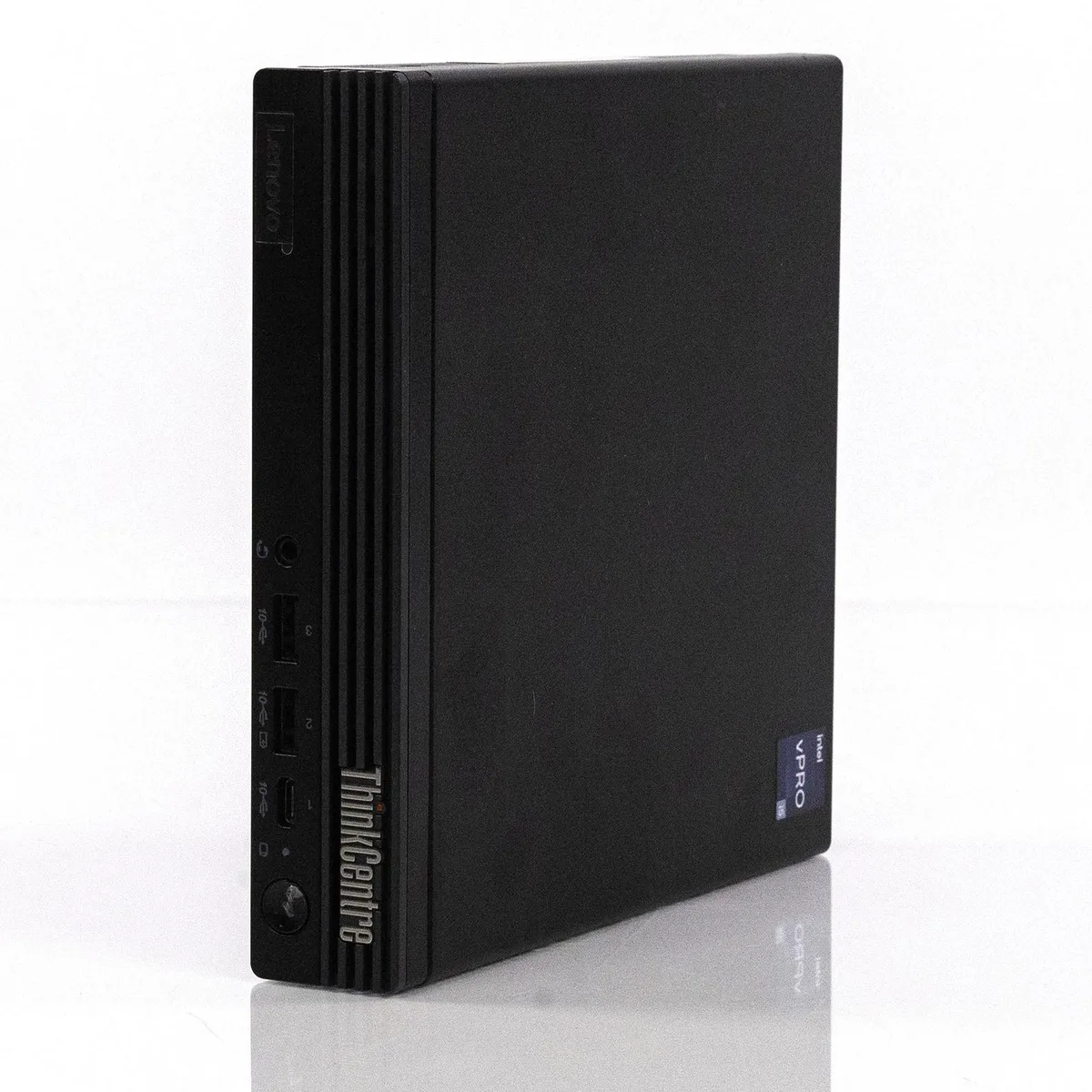 Compact black mini PC, rectangular with smooth matte finish