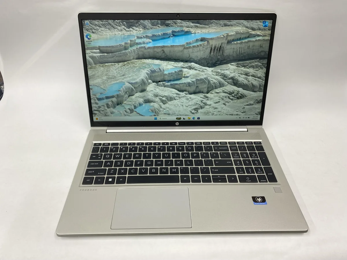 Silver HP ProBook 455 G10 laptop, 15.6 inch non-touch screen, charger included