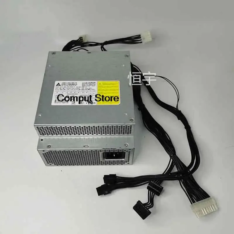 Rectangular silver metal ATX power supply unit with rear fan grille and cable connectors
