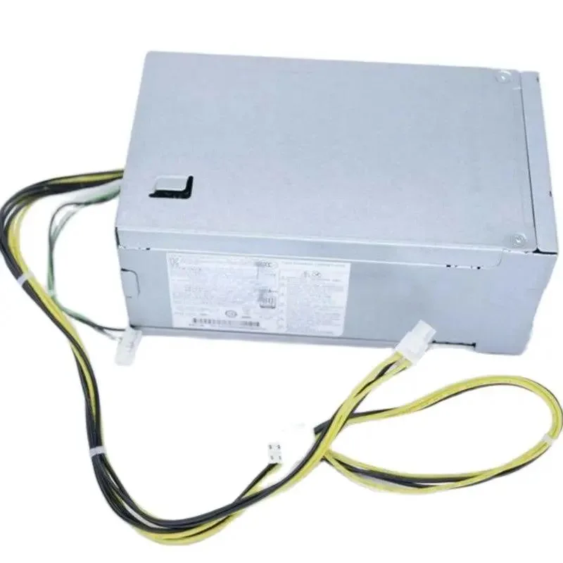 New ATX power supply unit in black metal casing with fan grille and cable bundle