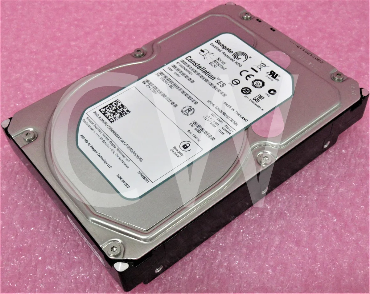 Silver 3.5 inch SAS hard drive with green circuit board visible underneath