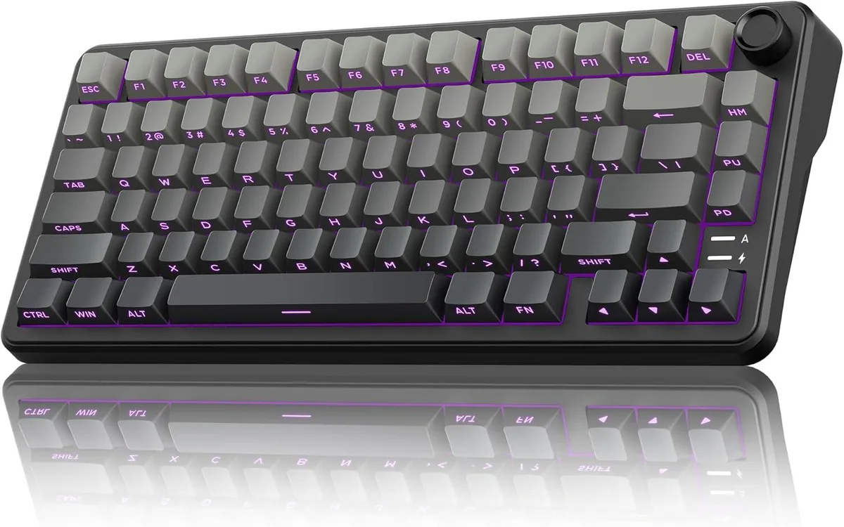 Compact 75 percent keyboard in gradient gray finish with a rotary knob