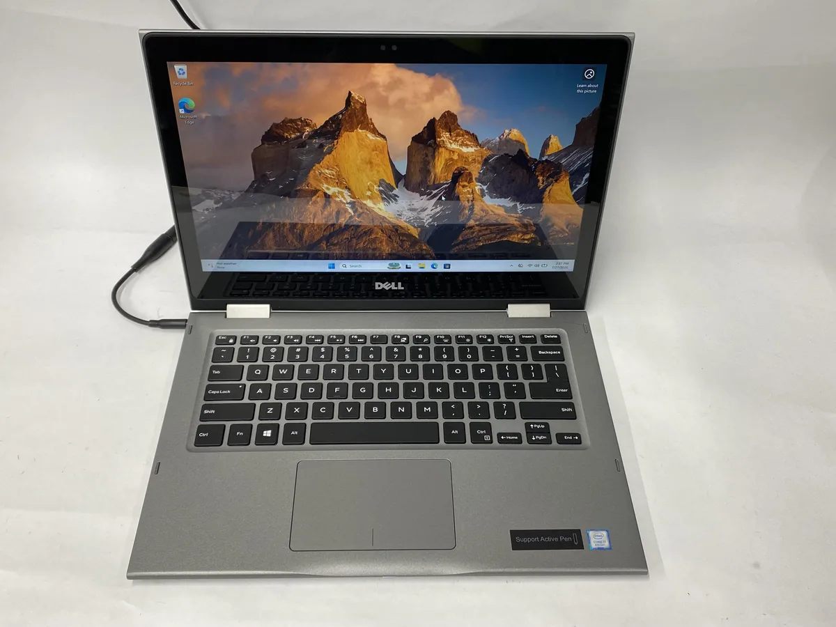 Silver 13-inch 2-in-1 laptop with touchscreen display