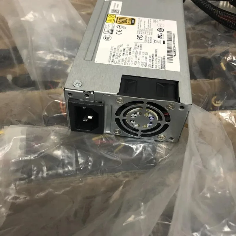 Compact 1U 350W ATX power supply with gold finish and rear fan grille