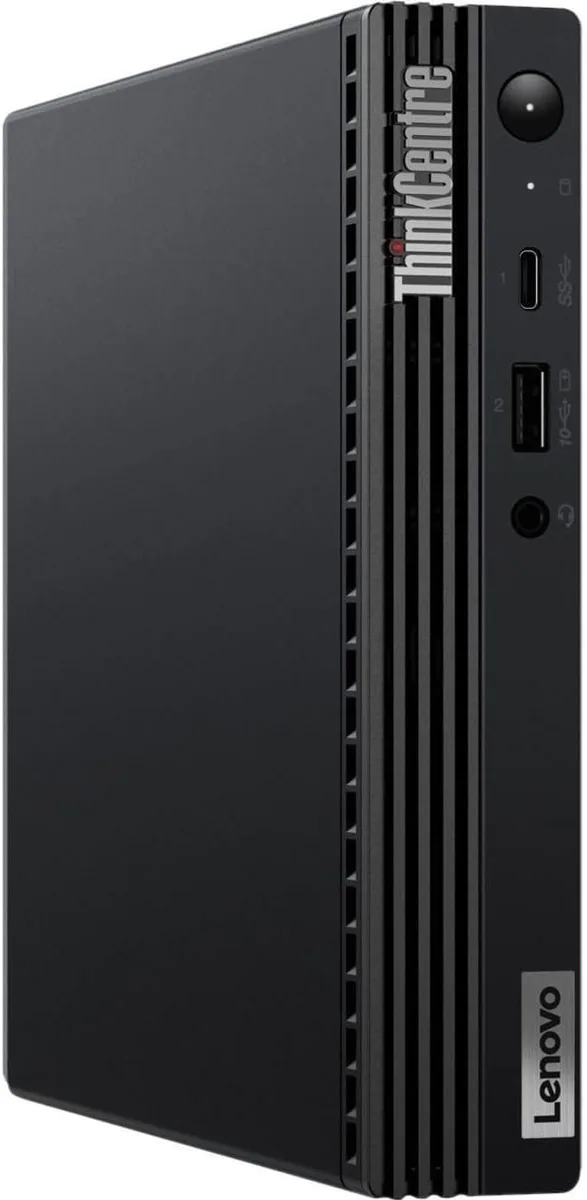 Small black square Mini PC with a 5G WiFi Bluetooth adapter
