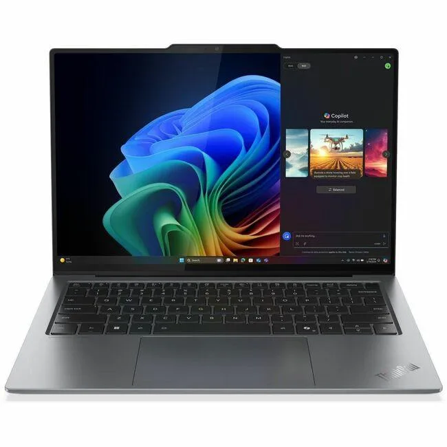 Gray 14-inch ThinkPad X9 laptop with OLED touchscreen, backlit keyboard and webcam