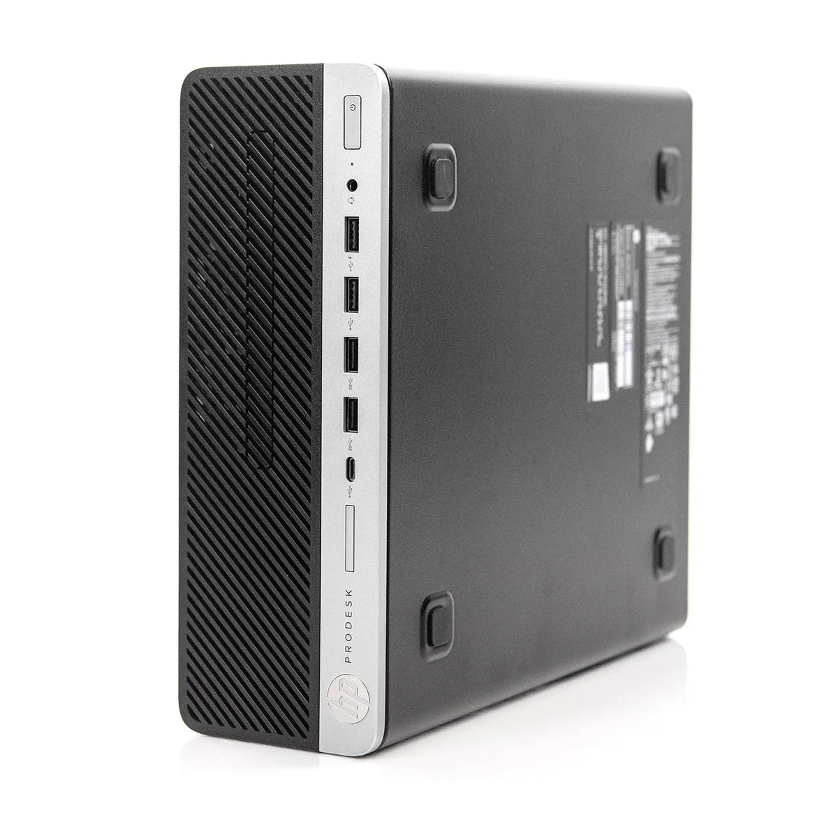 Compact black small-form-factor desktop tower with front panel ports