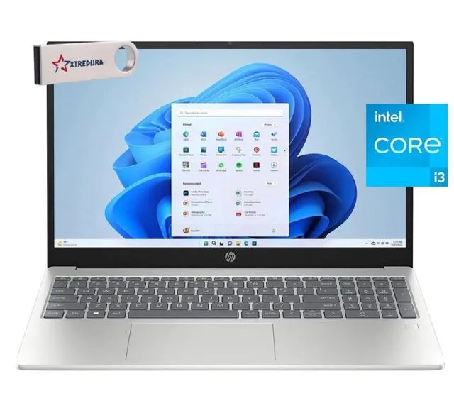 Silver 15 inch HP laptop closed on a flat surface