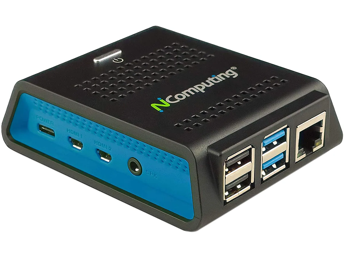 Small black thin client box with four USB ports and RJ-45 network jack