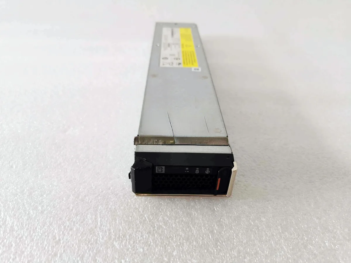 Rectangular ATX power supply unit with metal casing and cooling fan grille
