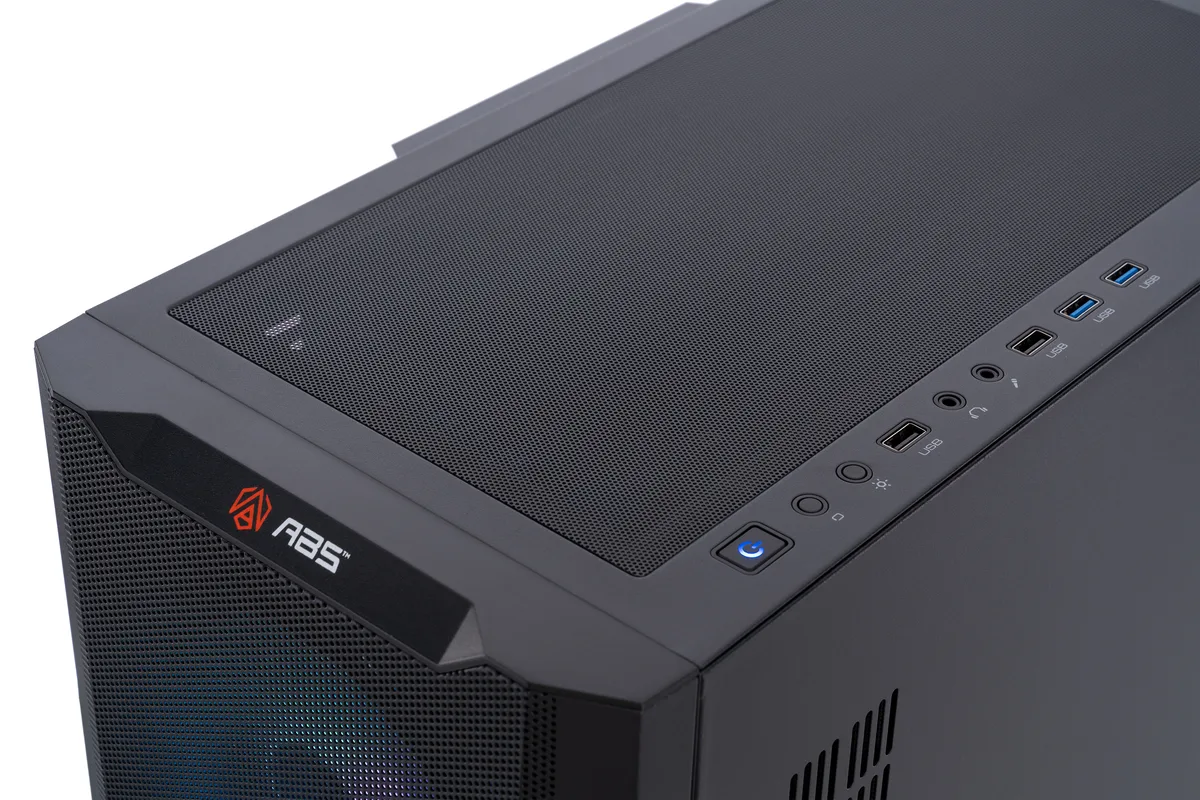 Black mid-tower gaming desktop with RGB CPU cooler and vented side panel