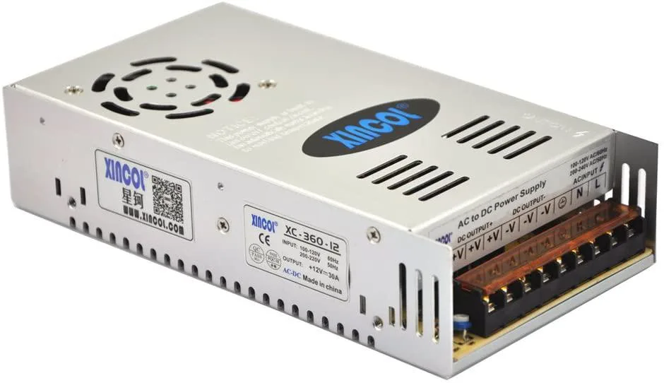 Silver metal rectangular power supply with screw terminals and voltage selector switch