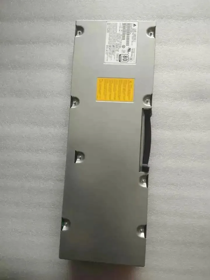Rectangular ATX power supply unit, matte metal finish, fan grille visible, labelled 482513-003 508548-001 DPS-725AB