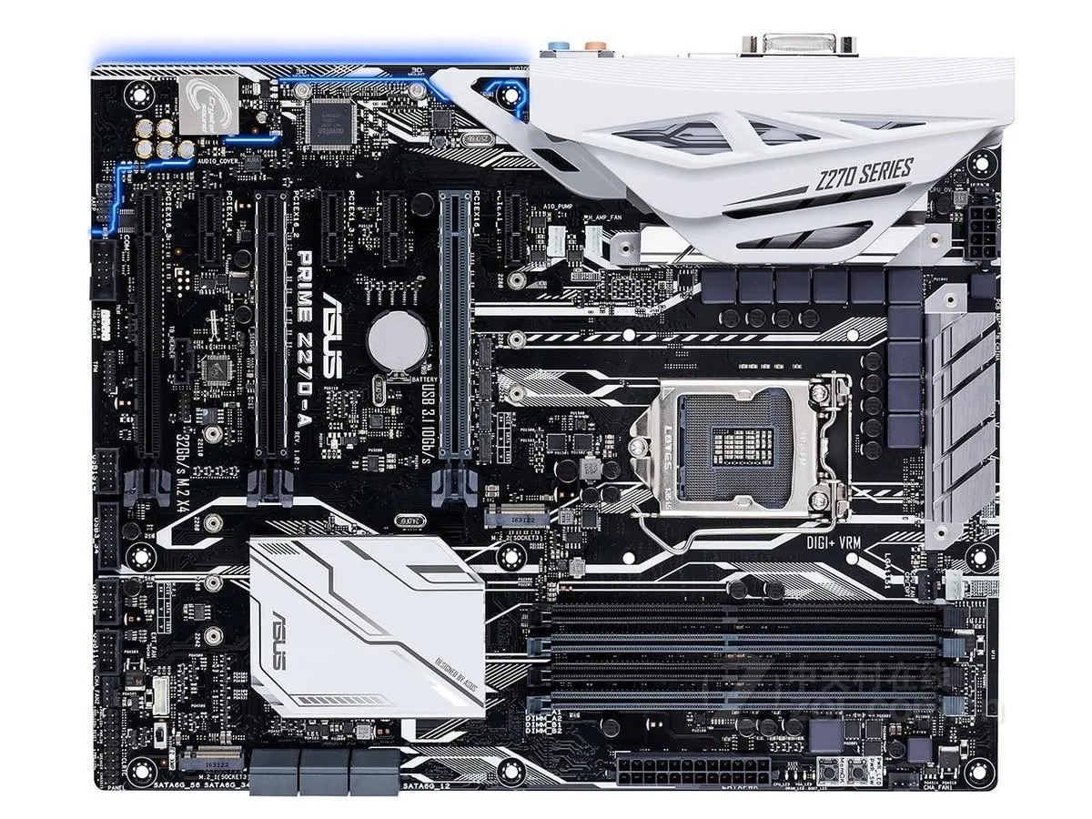 ATX motherboard with black PCB, silver heatsinks and rear I/O shield