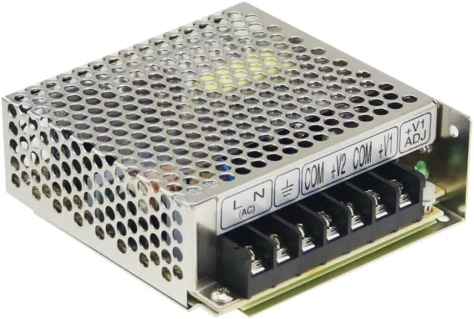Compact enclosed switching power supply unit with metal casing and terminal block outputs