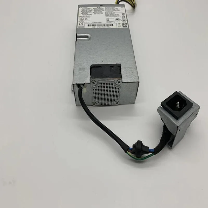 Rectangular black metal PSU unit with side fan grille and rear power socket